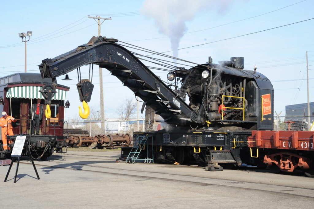 workers at the rail crane